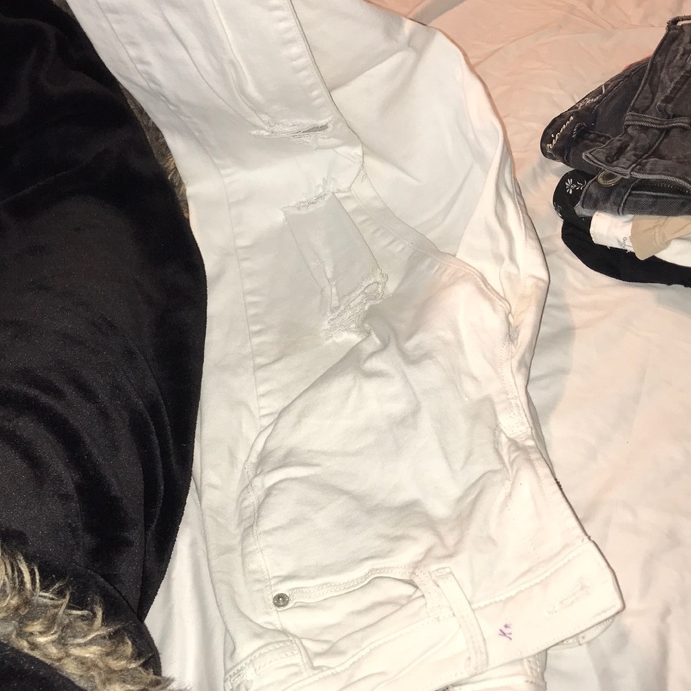 white old Navy rockstar mid rise ripped jeans